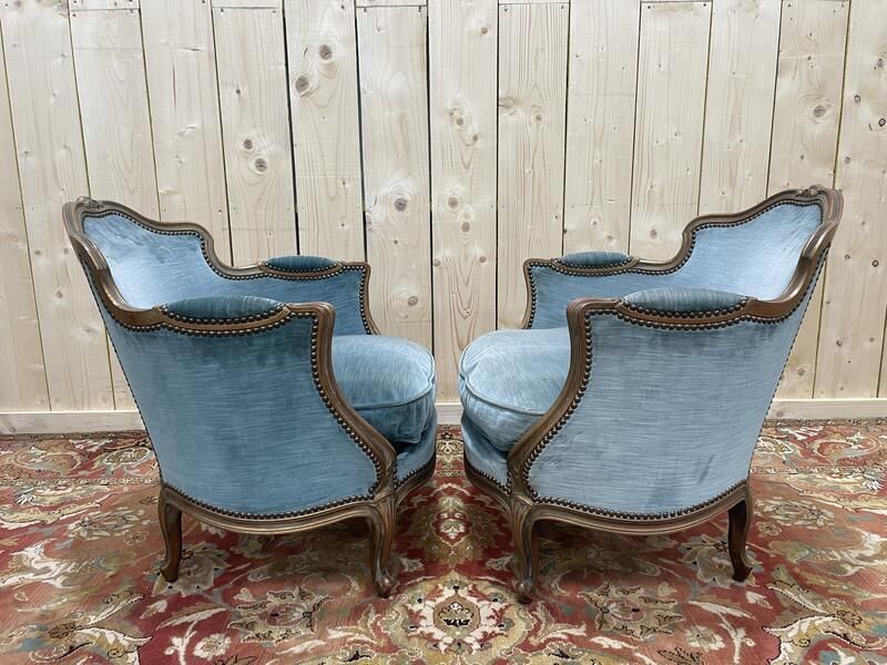 Paire De Fauteuils Bergères De Style Louis XV En Velours Bleu Et Bois Doré photo 840.0