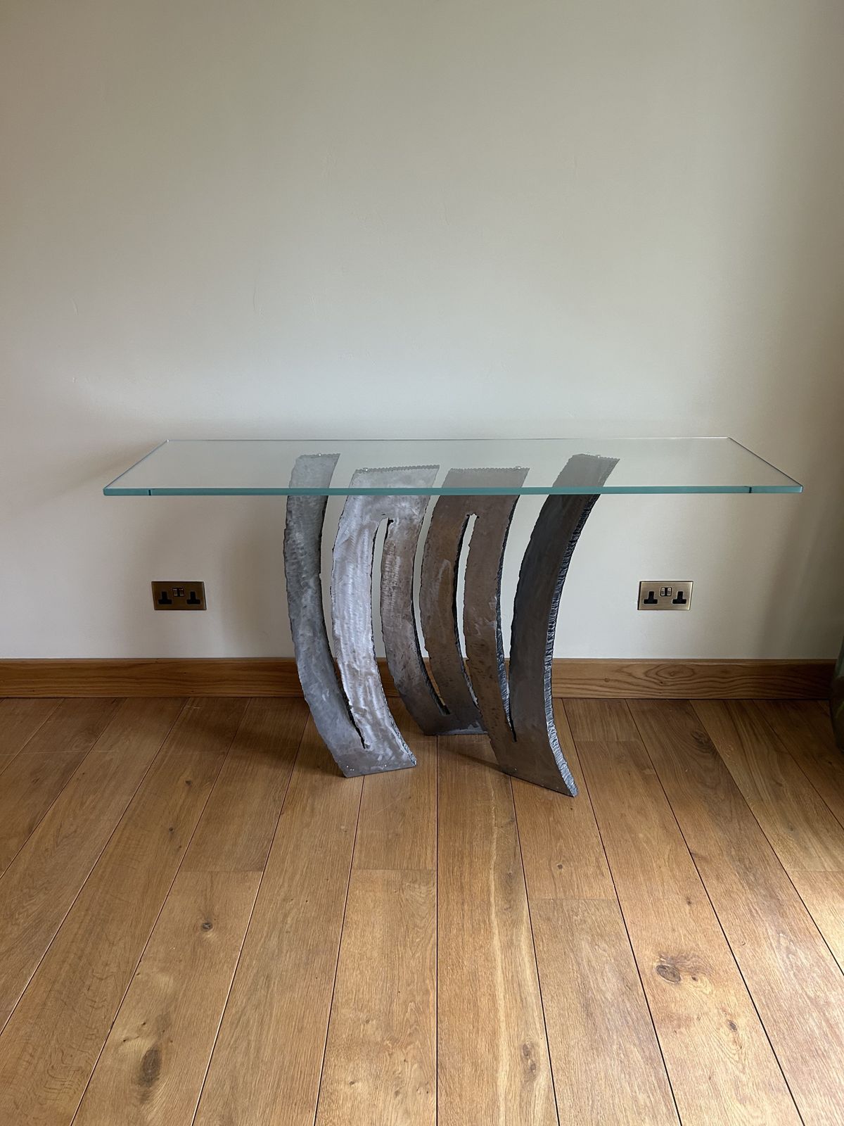 Glass Top And Polished Steel Base Console photo for sale
