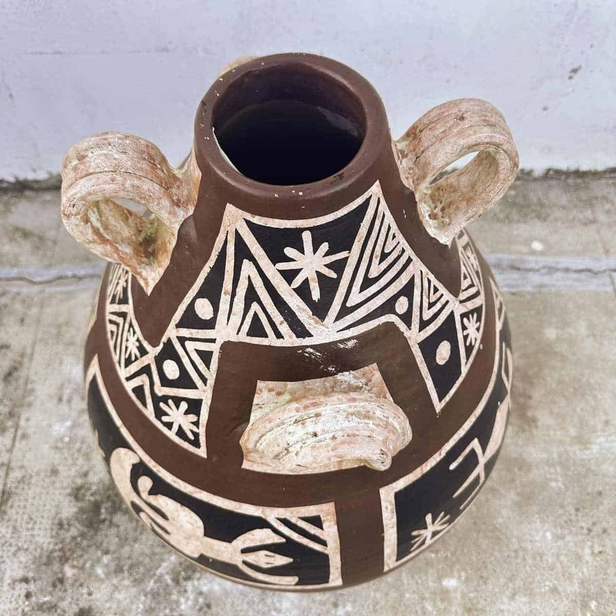 Ceramic Vase Decorated With Ancient Symbols, A Unique Piece That Tells Distant Stories. photo Home Decor