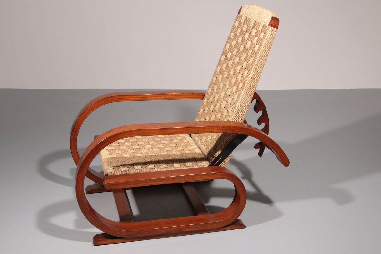 An Exceptionally Rare Mahogany Recliner Crafted In Italy During The 1950s" photo vintage