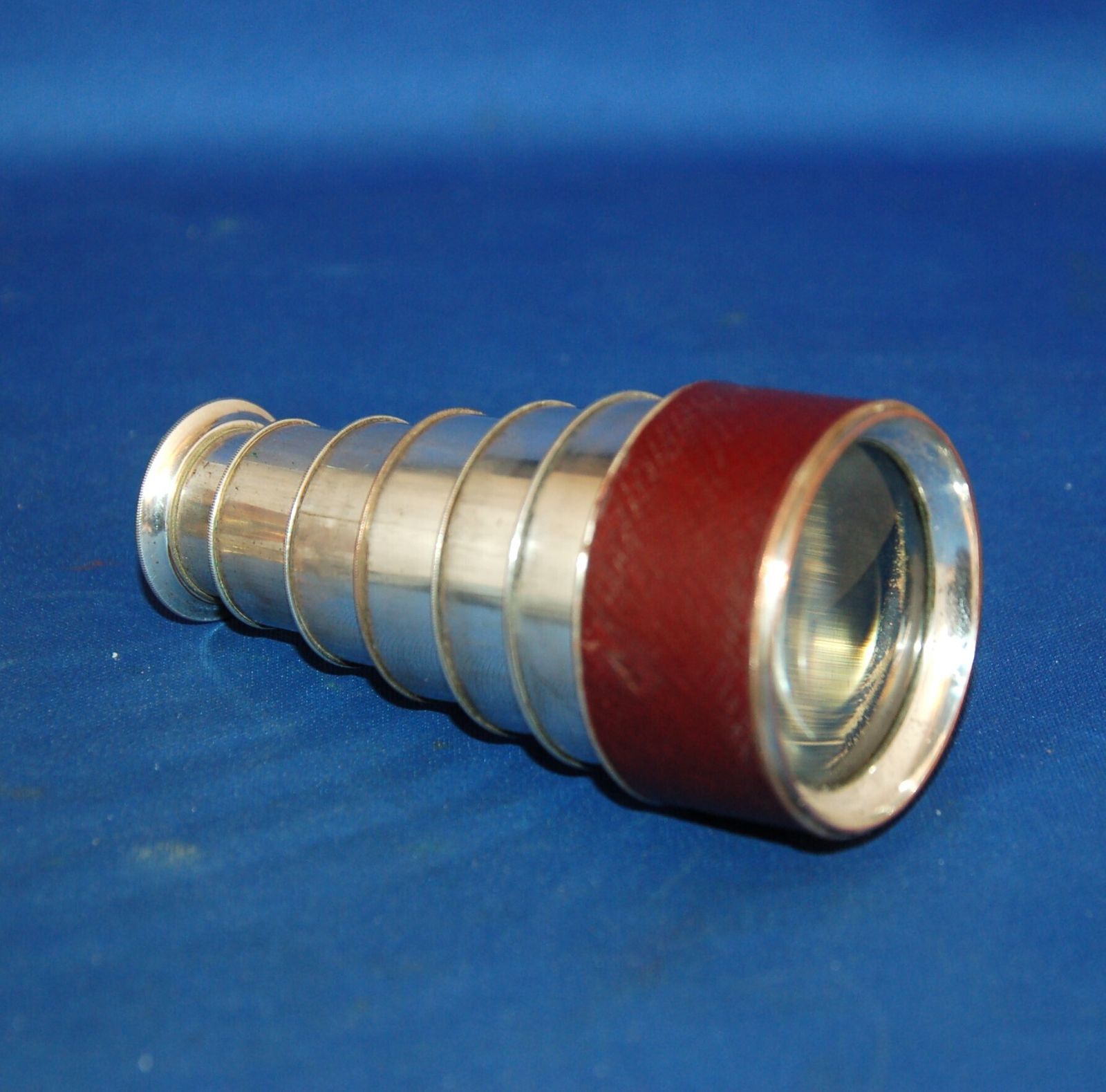 An Antique Six Draw Monocular, White Metal  Over Copper, Lenses Good