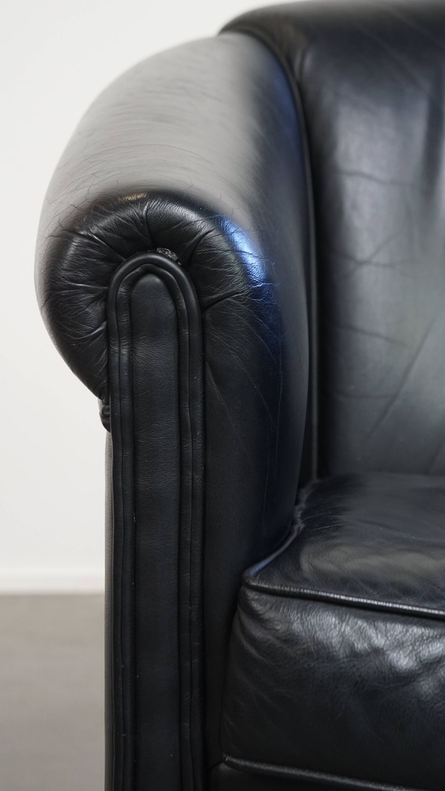 photo for sale Great Black Cowhide Club Chair In English Style With A Timeless Design