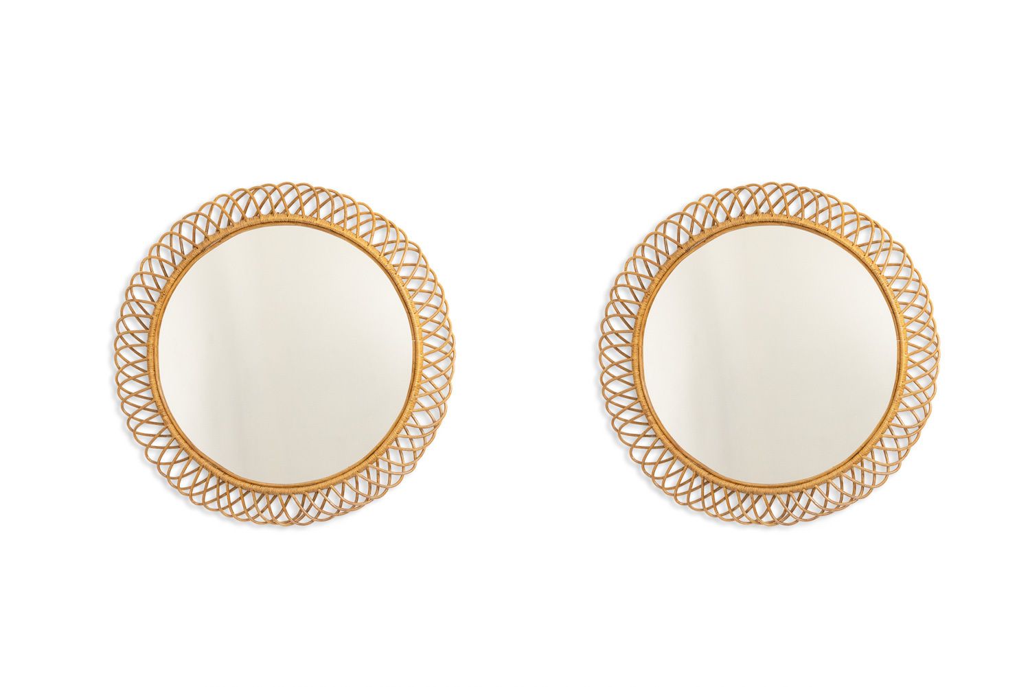 Pair Of Round Rattan Mirrors With Interlacing. 1980s.