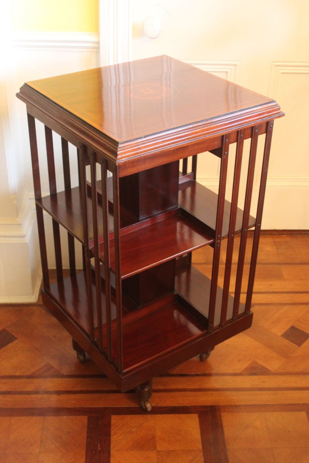 An Edwardian Mahogany And Inlaid Revolving Bookcase photo furniture