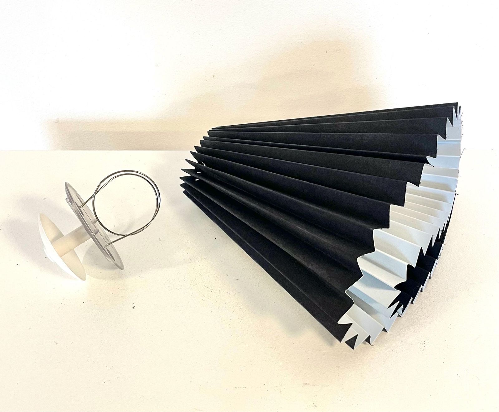Danish Vintage Mid Century Modern Design Table Lamp With White Wooden Base And Black Pleated Fabric Shade With Cool Plastic Top photo vintage