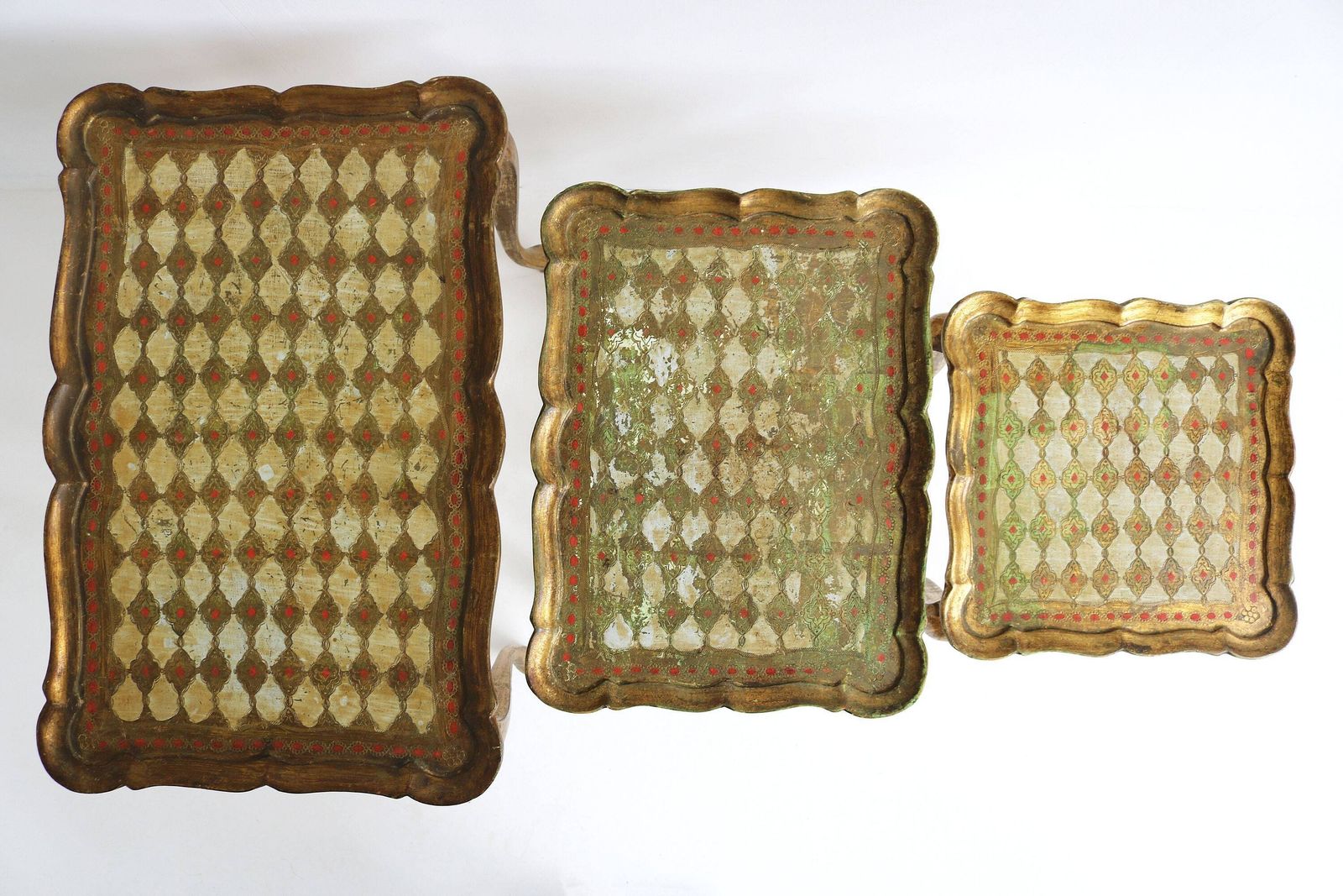 Graceful Set Of Three Italian Florentine Gold Hollywood Regency Wood Stacking Nesting Tables Additional Tables Side Tables Set Tables 1960s photo vinterior