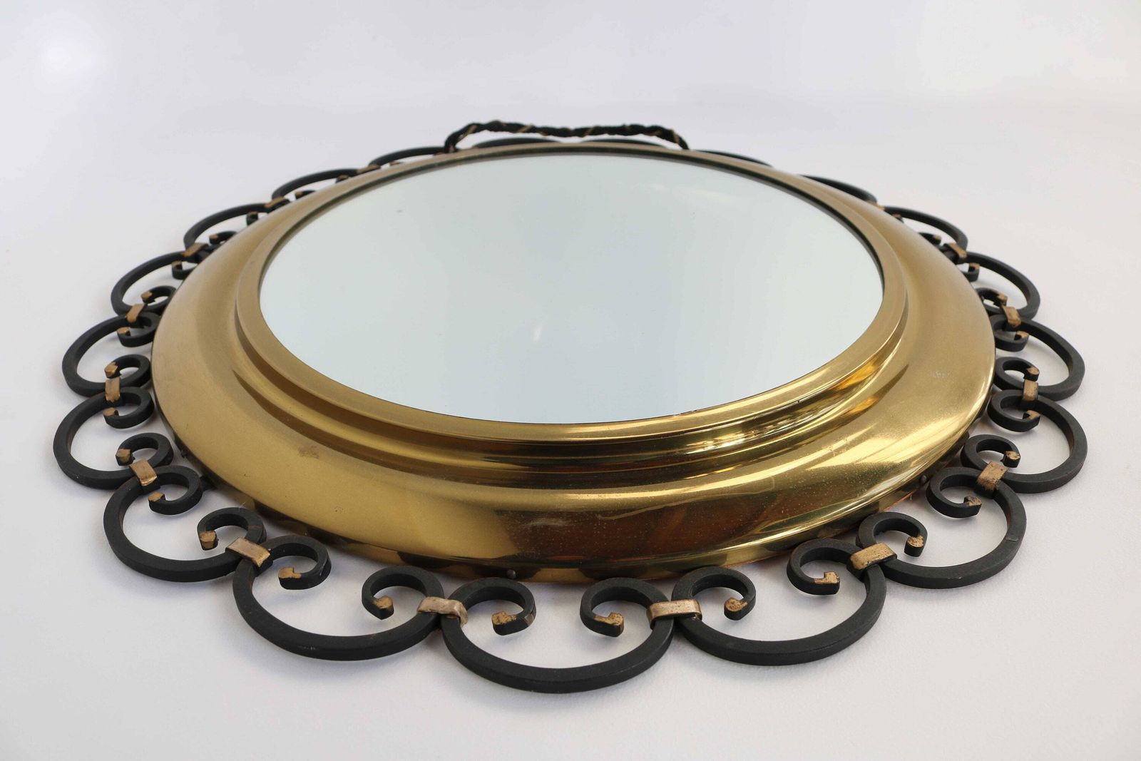 Vintage Round Shape Wrought Iron And Brass Wall Mirror Black And Golden Accents French Hall Mirror Regency Style Entry Hall Mirror 1960s photo vintage