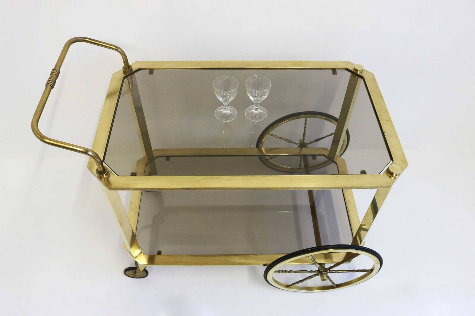 Hollywood Regency Serving Trolley Vintage Bar Cart Cocktail Entertainment Beverages Tea Cart Mid Century Brass Side Table Smoked Glass 1960 photo for sale