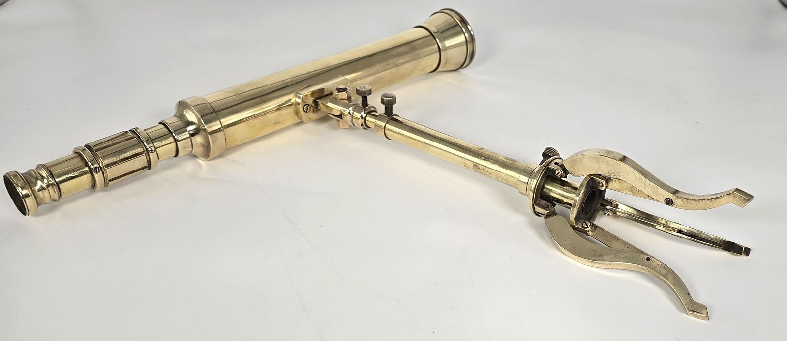 photo furniture A Small Mid 19th Century Brass Telescope With An Original Folding Brass Tripod Stand.