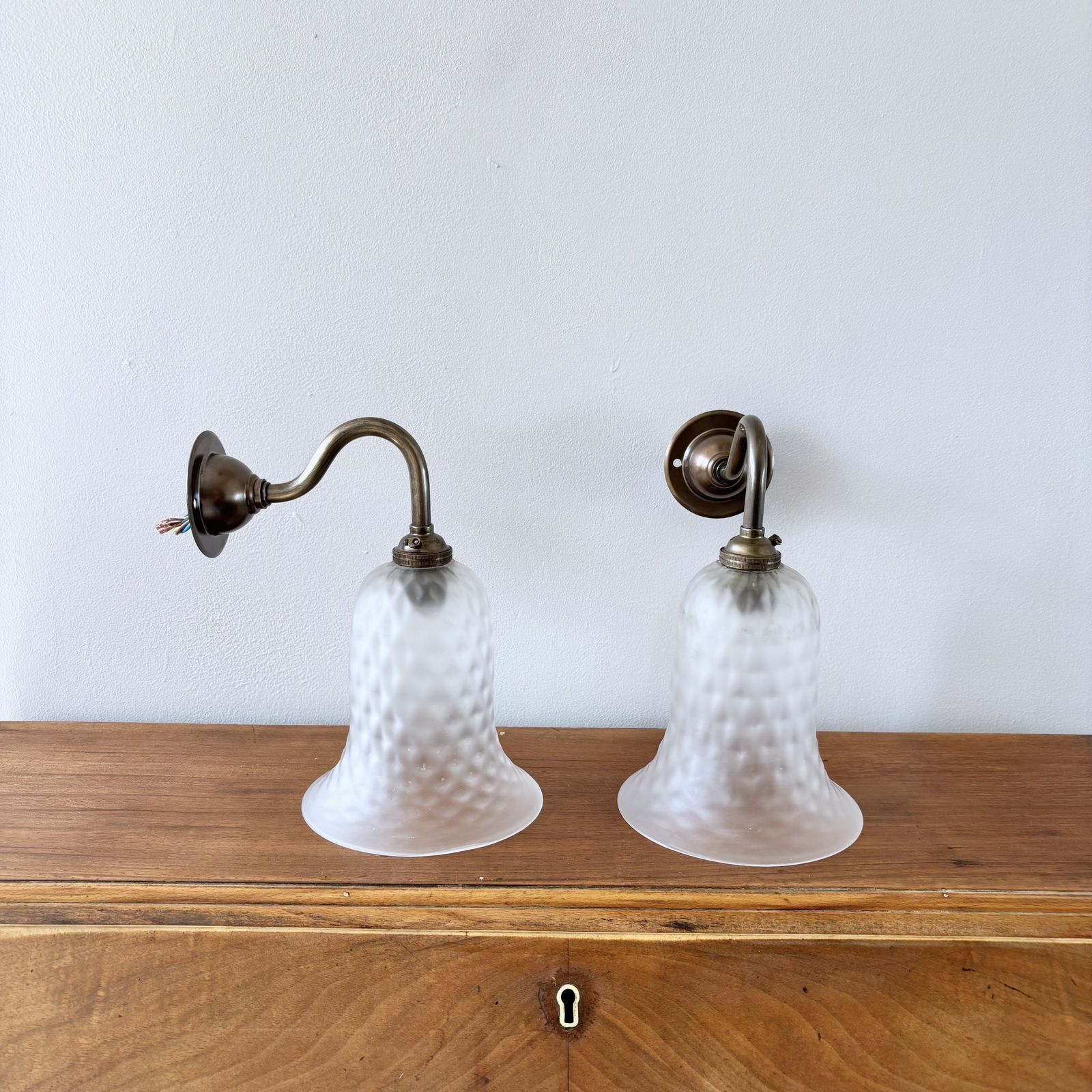 Pair Of Frosted Bell Glass Shade Wall Lights In Antique Brass photo Lighting