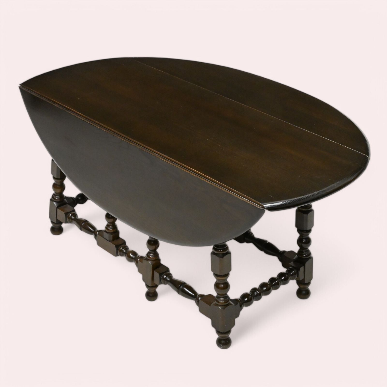 photo buy Ercol Oval Coffee Table Gate Leg Dark Finish Free Nationwide Delivery