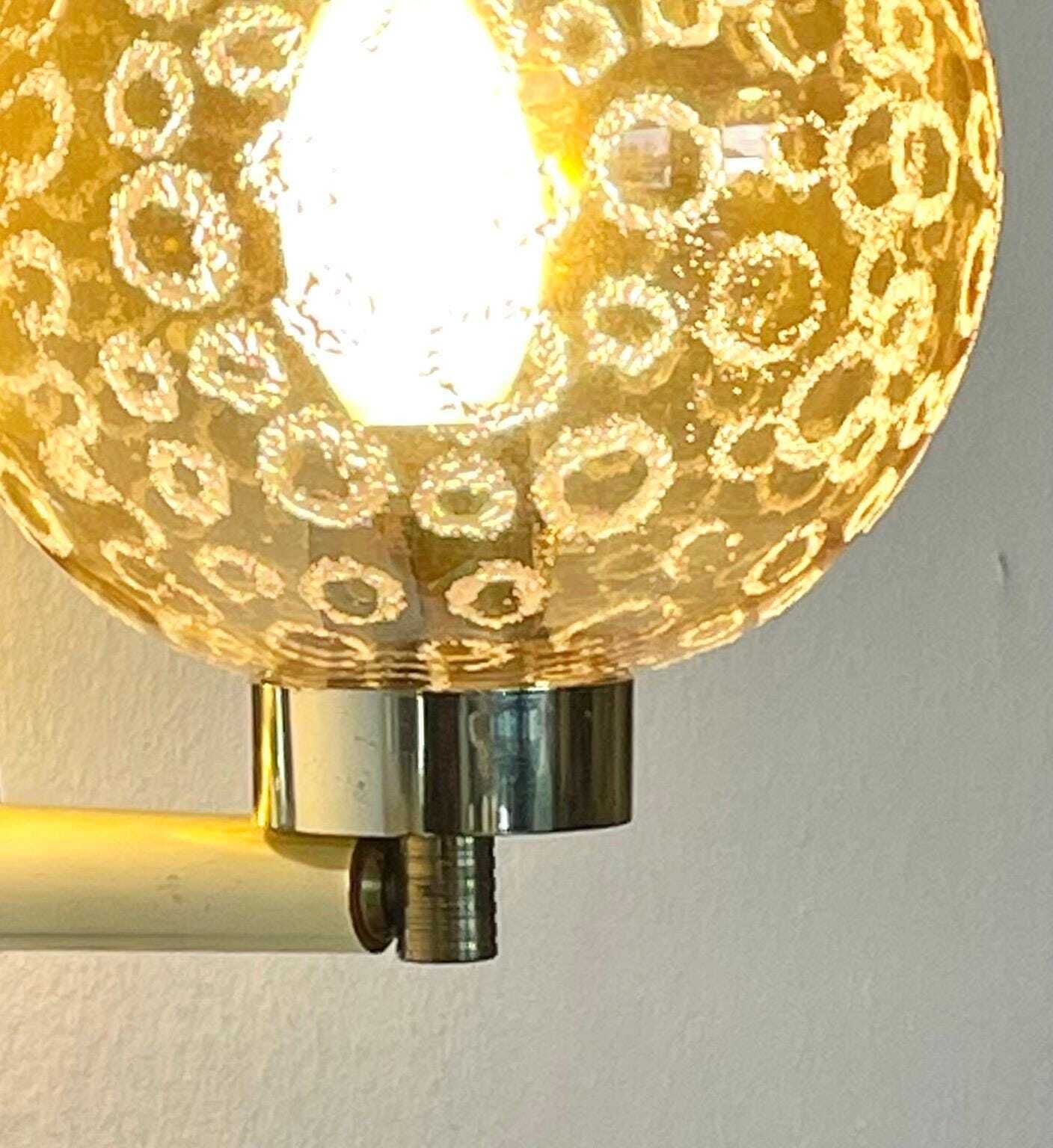 Mid Century Modern Vintage Danish H.N. Design Wall Lamps With Round Ball Glass Shades And Golden Plastic Wall Mounts photo for sale