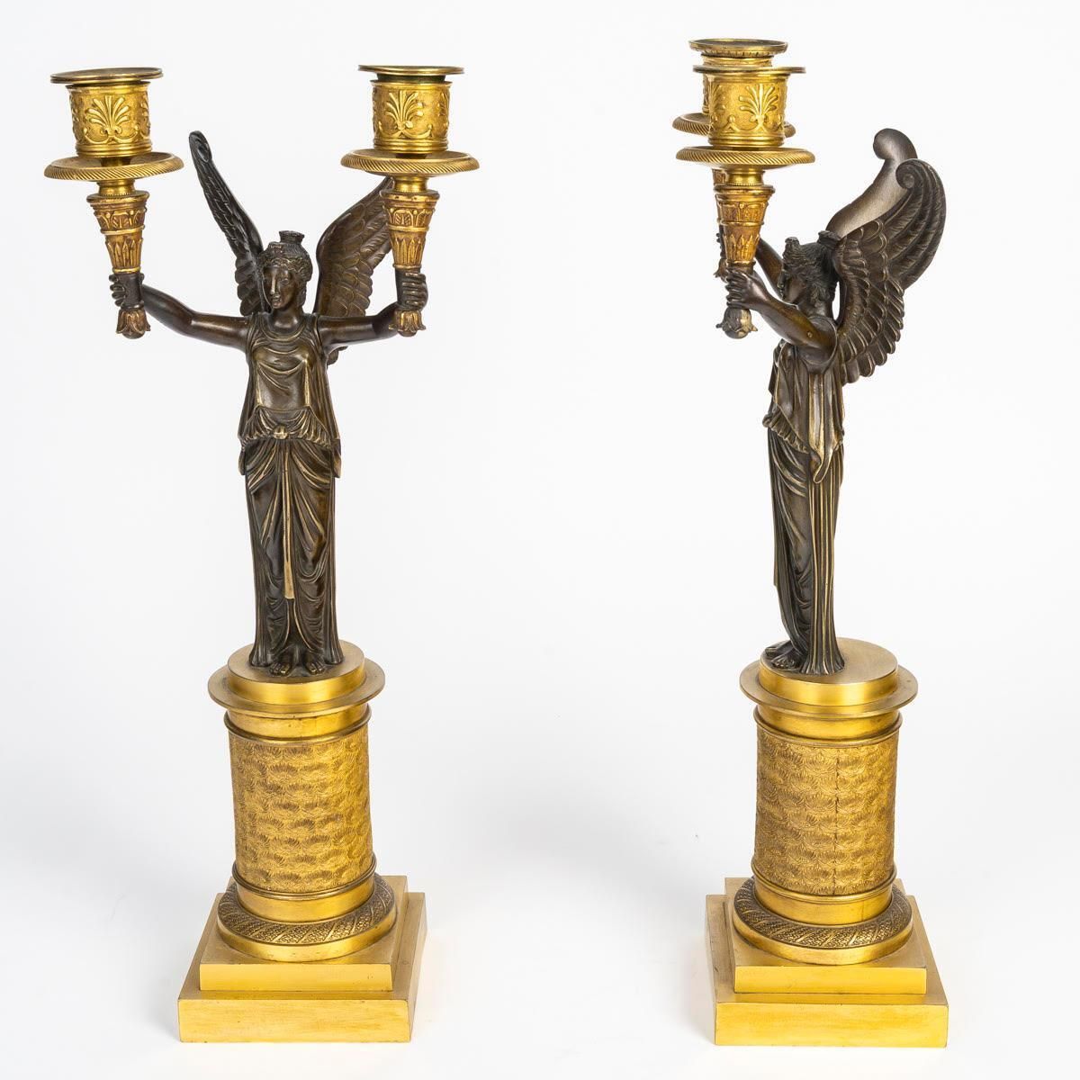 A Pair Of Gilt Bronze And Patinated Candelabra With Winged Victories. photo Home Decor
