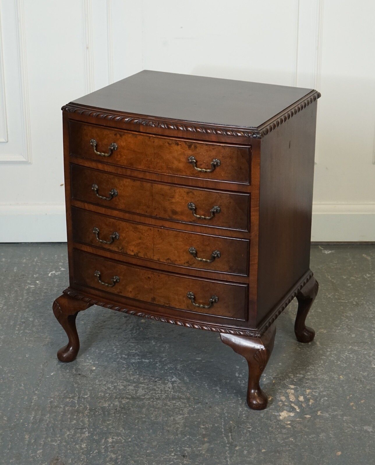 Figured Victorian Walnut Bow Fronted Chest Of Drawers Raised On Queen Anne Legs photo for sale