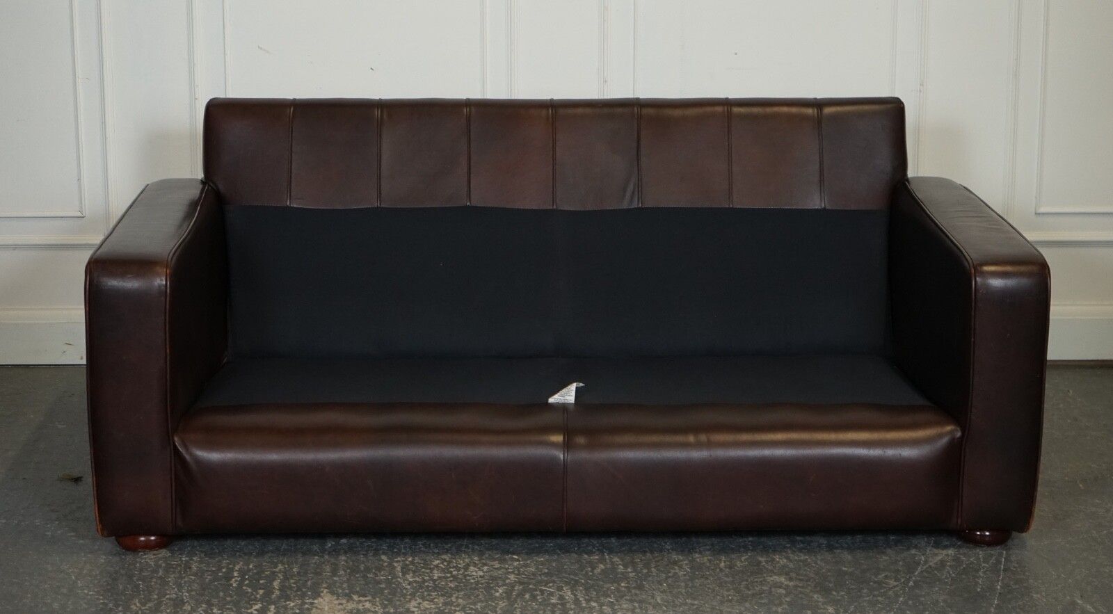 photo vintage Vintage Distressed Brown Leather Two To Three Seater Sofa