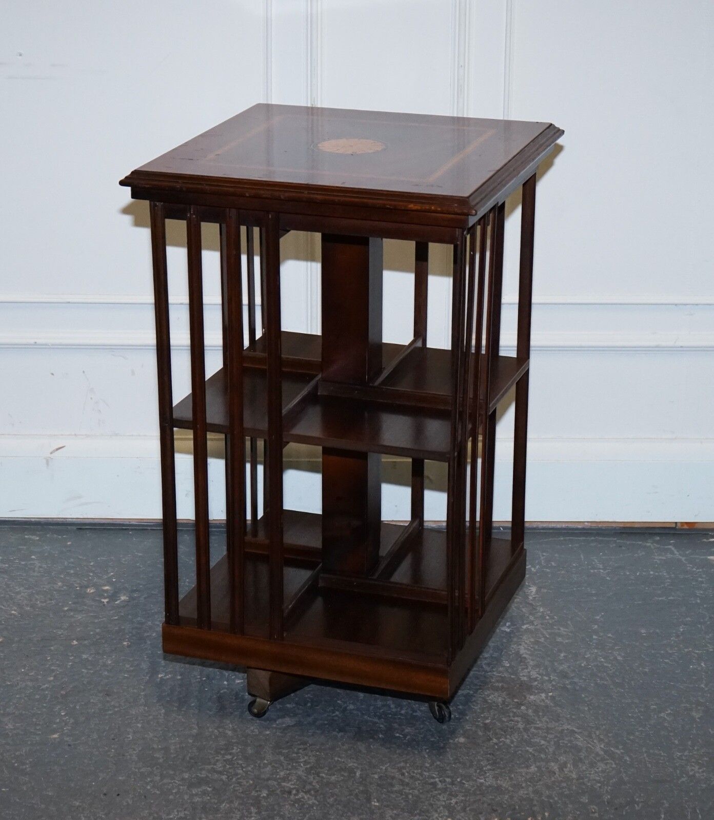 Mid Centry Sheraton Revival Inlaid Revolving Bookcase End Table On Castors photo for sale