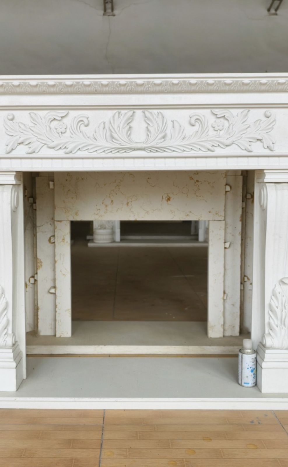 Refined Neoclassical Hand Carved White Marble Composite Fireplace Mantle photo for sale