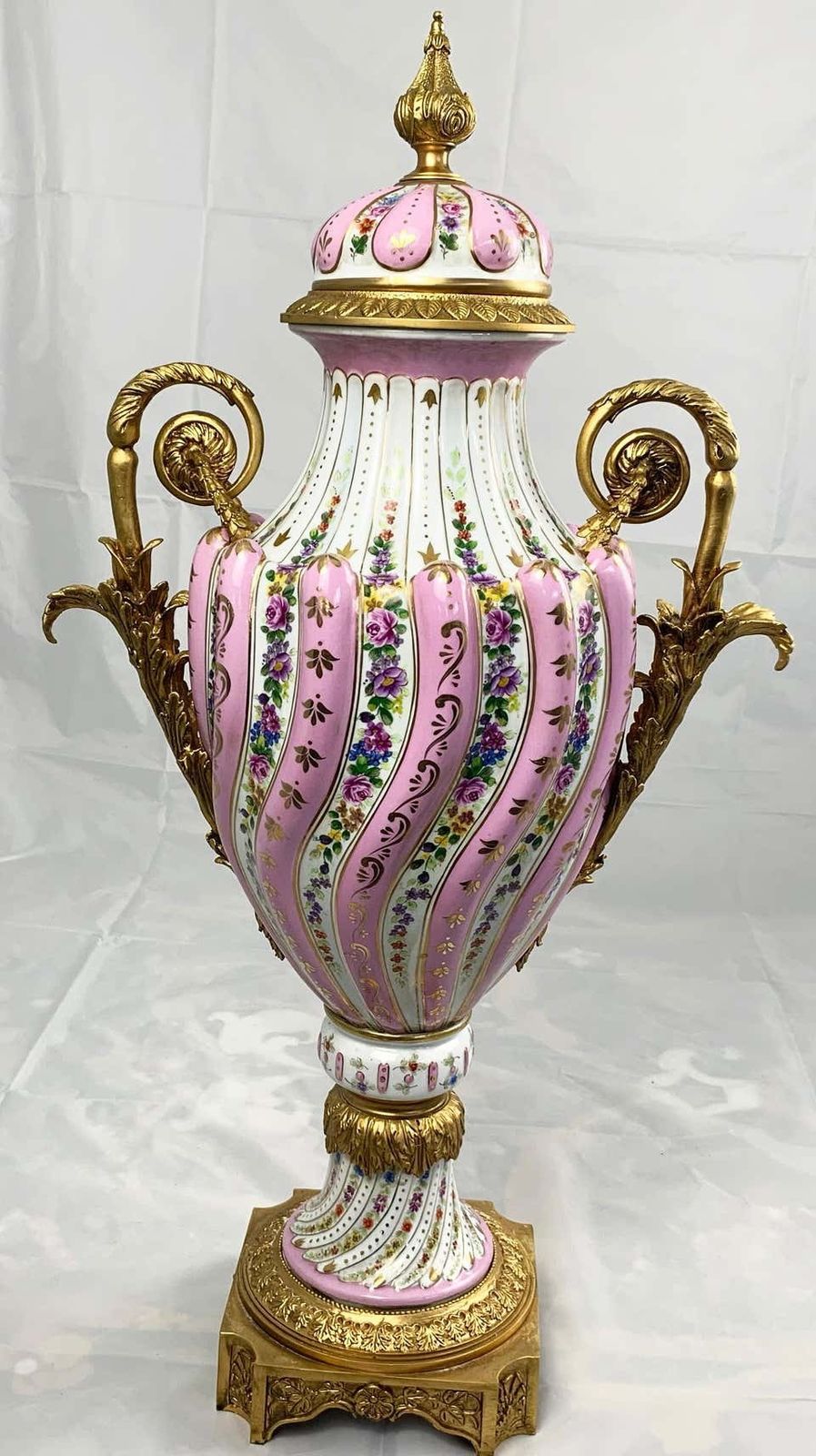 photo furniture 20th Century Pair Of Ormolu Mounted Pink Sevres Vases With Lids