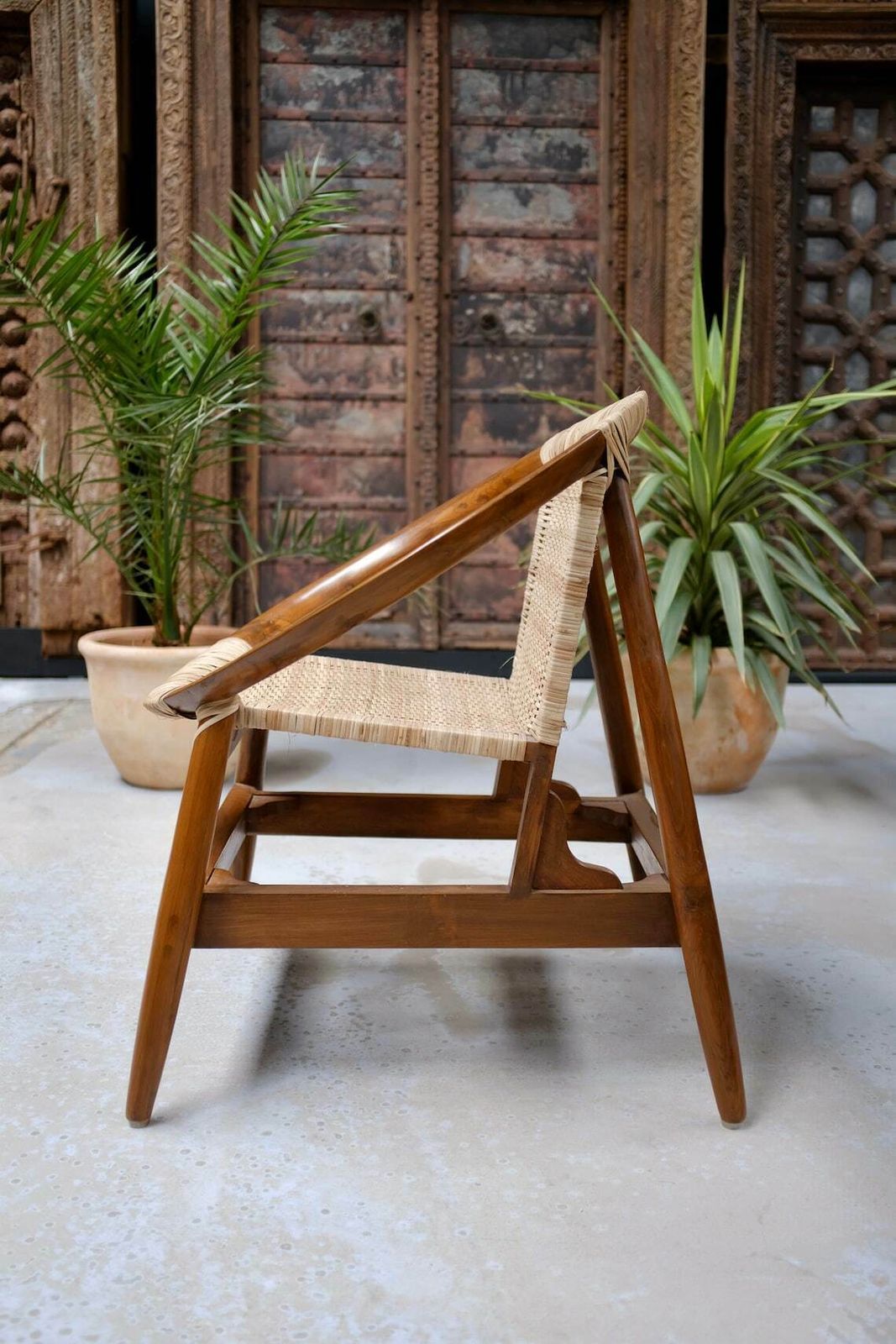 Handcrafted Teakwood & Cane Lounge Chair – Sculptural Curved Frame, Woven Seat For Indoor & Outdoor Use photo furniture