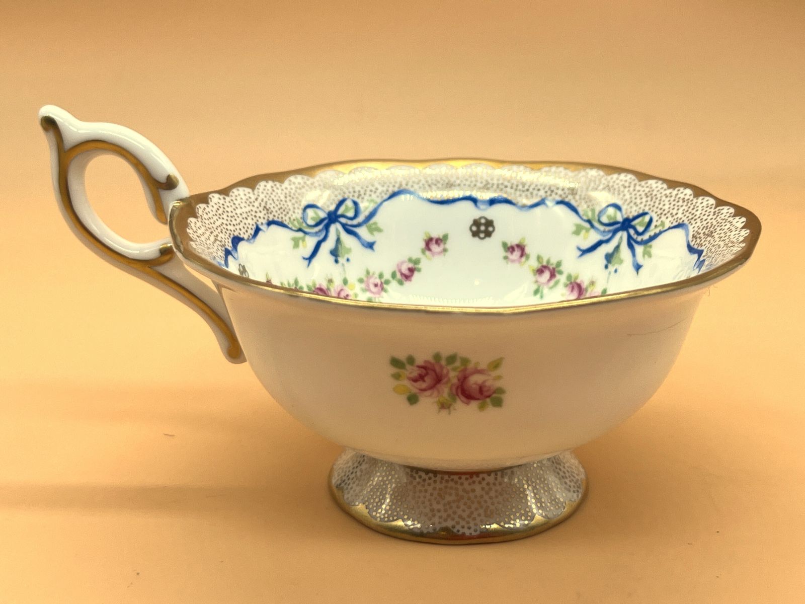 Wedgwood China Harlequin Collection Ribbon And Roses Design Footed Tea Cup And Saucer Duo. photo for sale