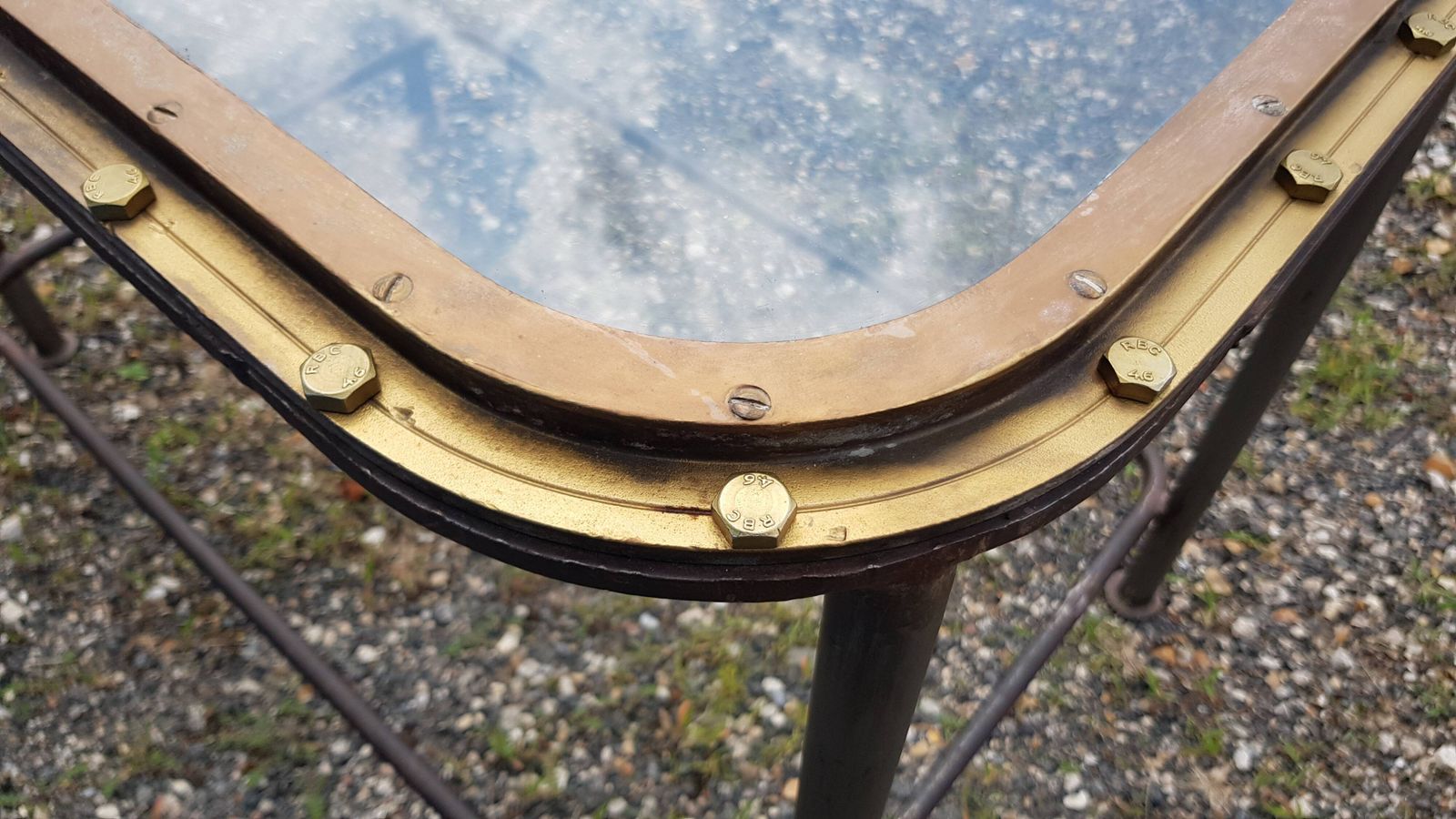 Furniture Table With Old Brass Ship's Porthole With Iron Base / 110 X 70 X 76 Cm photo
