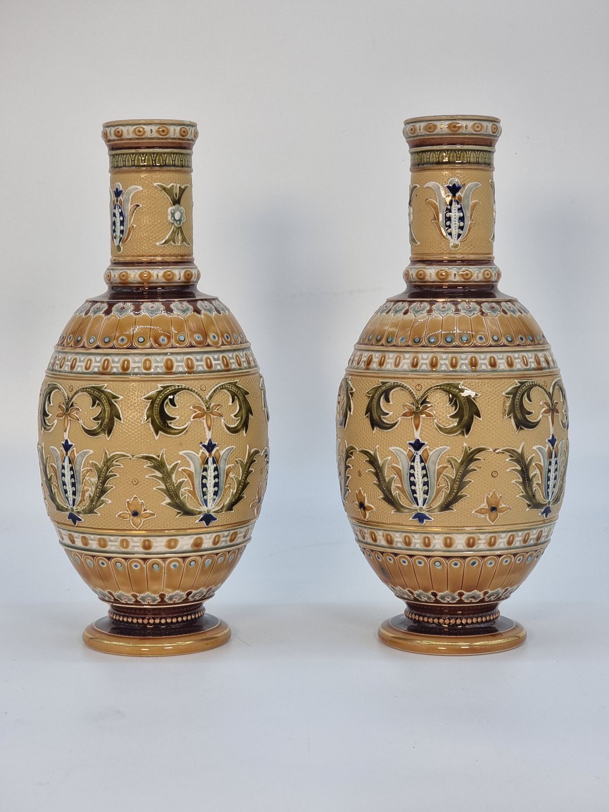 A Pair Of Late 19th Century German Pottery Vases, Made By The Mettlach Factory, Circa 1890