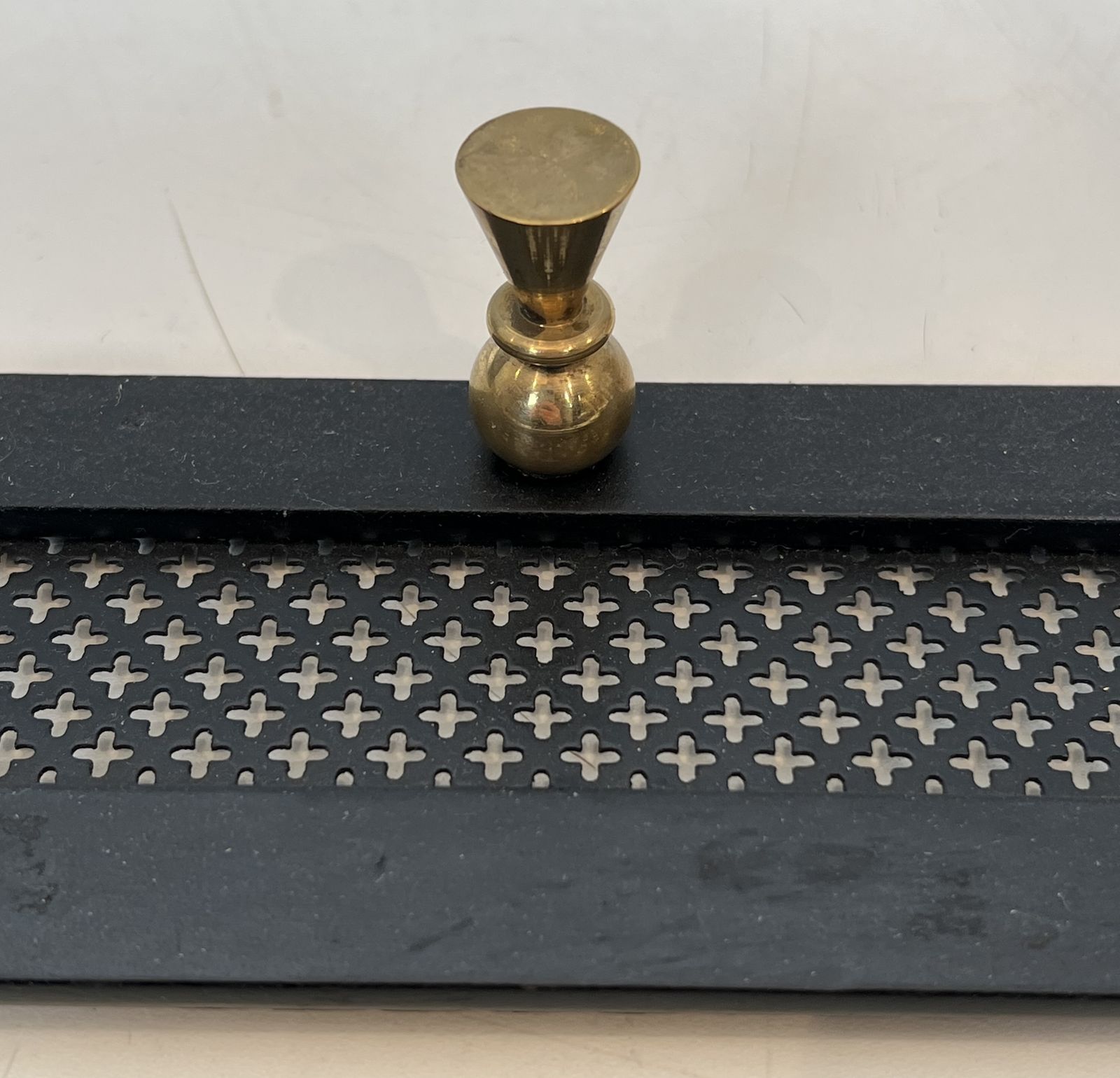 photo furniture Coat Rack In Black Lacquered Metal, Perforated Sheet Metal And Brass In The Style Of Mathieu Matégot
