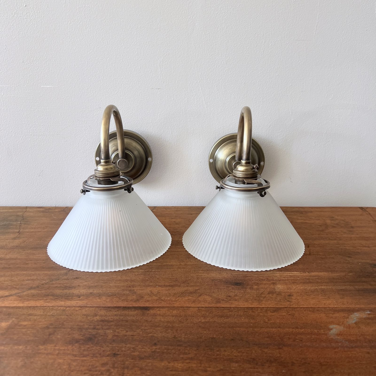 Newly Made Antique Brushed Brass Wall Lights With Contemporary Frosted Conical Shades