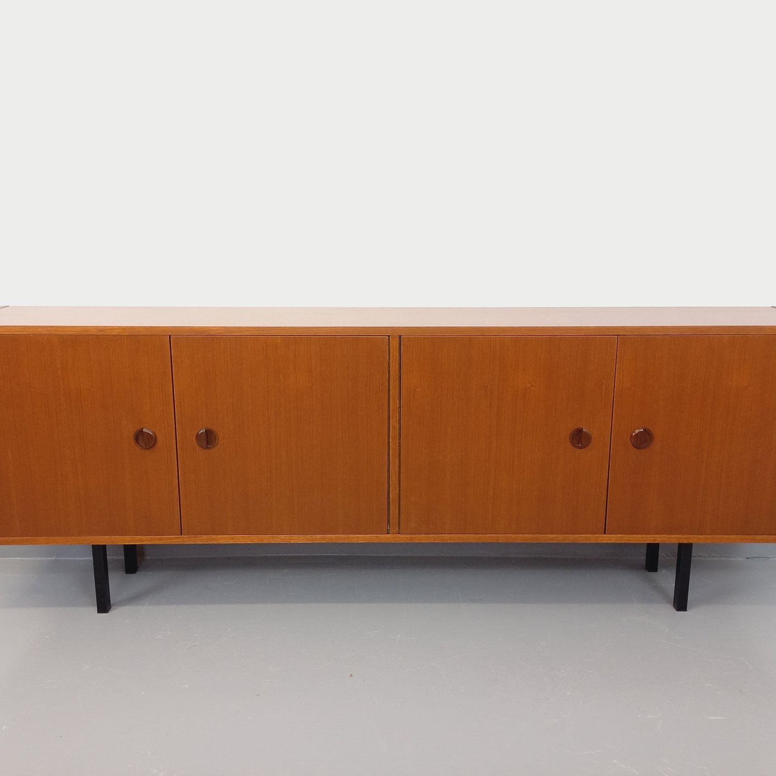 Modernist Sideboard In Teak With Black Metal Legs photo for sale