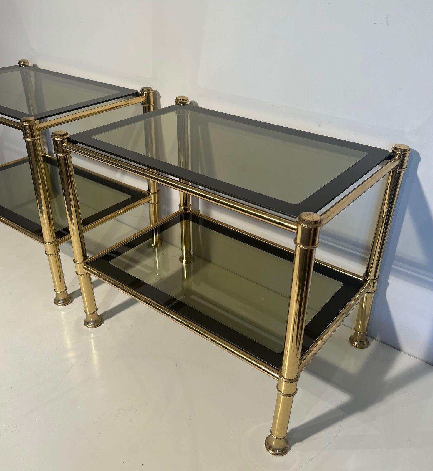 Pair Of Brass End Tables With Smoked Glass Trays. Circa 1970 photo for sale