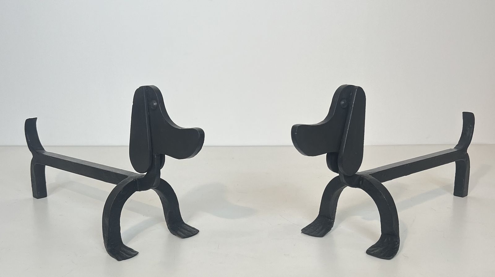 Pair Of Wrought Iron Andirons Depicting Dachshunds Attributed To Edouard Schenck