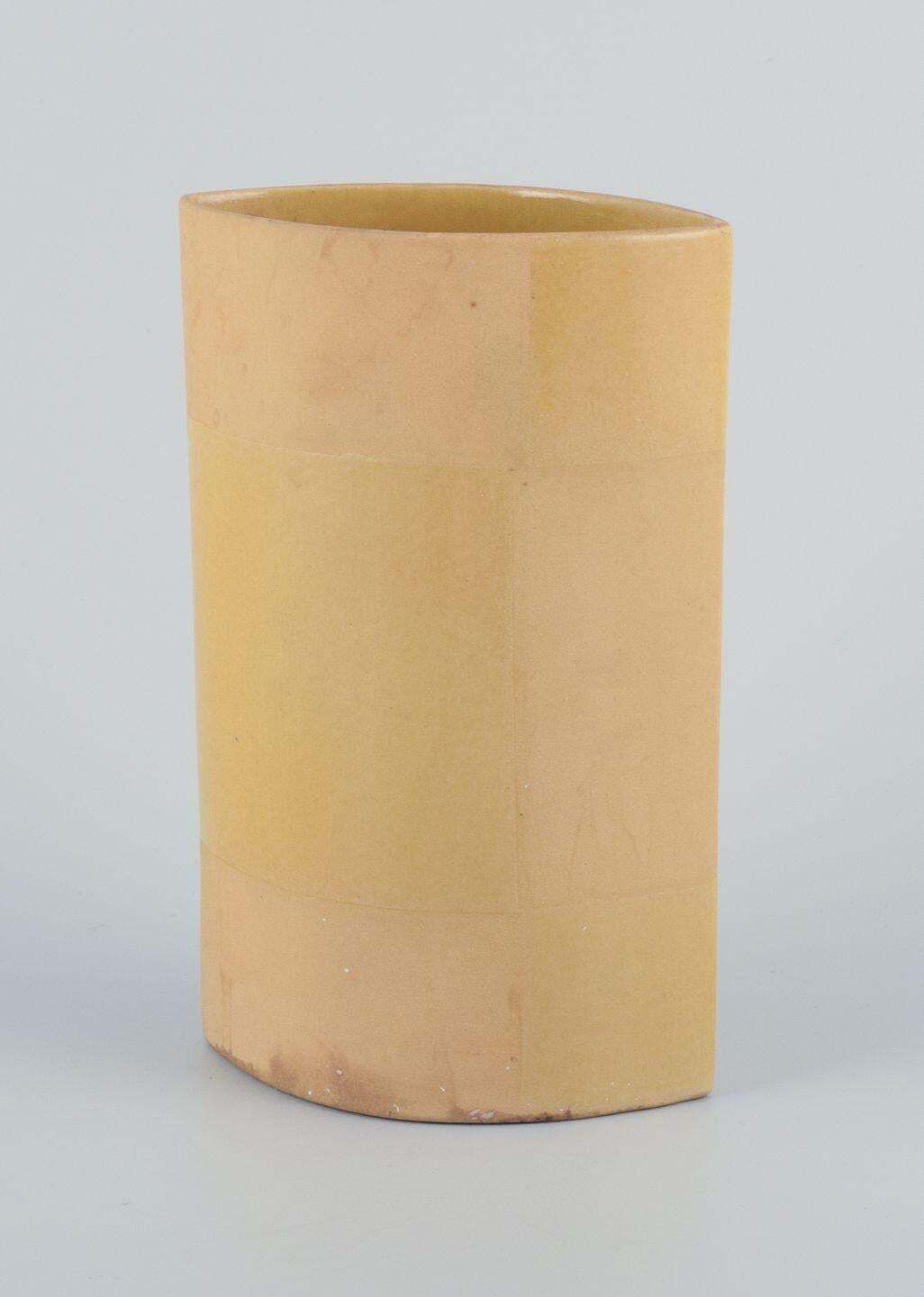 European Studio Ceramicist. Ceramic Vase With Yellow Glaze. 1980s photo furniture