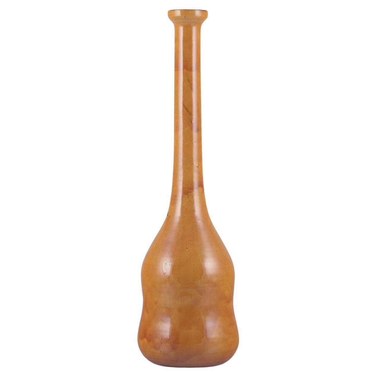 Biot, France. Unique Floor Vase In Ceramic With Narrow Neck. Ochre Yellow Glaze.