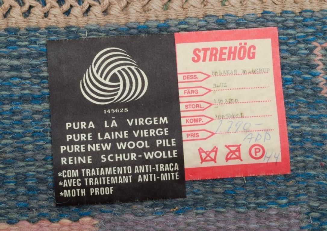 Swedish Carpet In Pure Wool. Geometric Pattern In Blue, White, And Pink Colors. photo buy