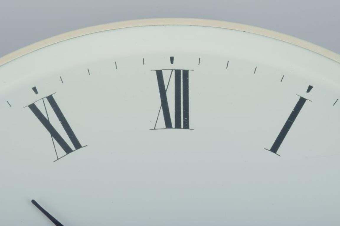 Henning Koppel For Georg Jensen. Wall Clock Made Of White Plastic And Metal. photo for sale