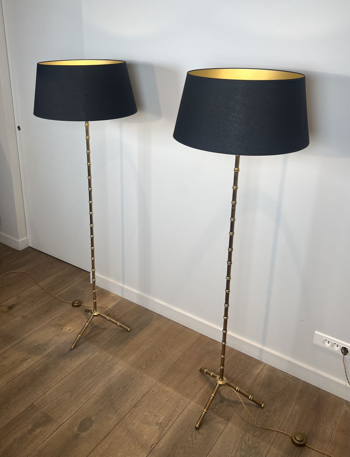 photo for sale Pair Of Faux Bamboo Floor Lamps In Bronze And Brass By Jacques Adnet