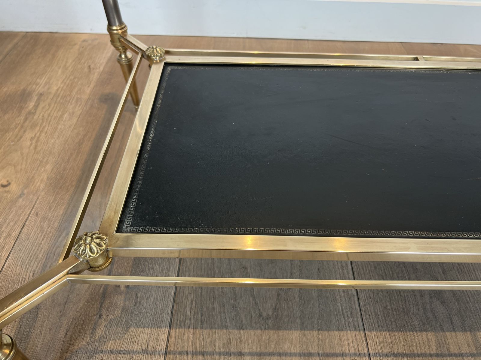Furniture Brass Coffee Table With Black Leather Top And Gold Trim From Maison Jansen photo