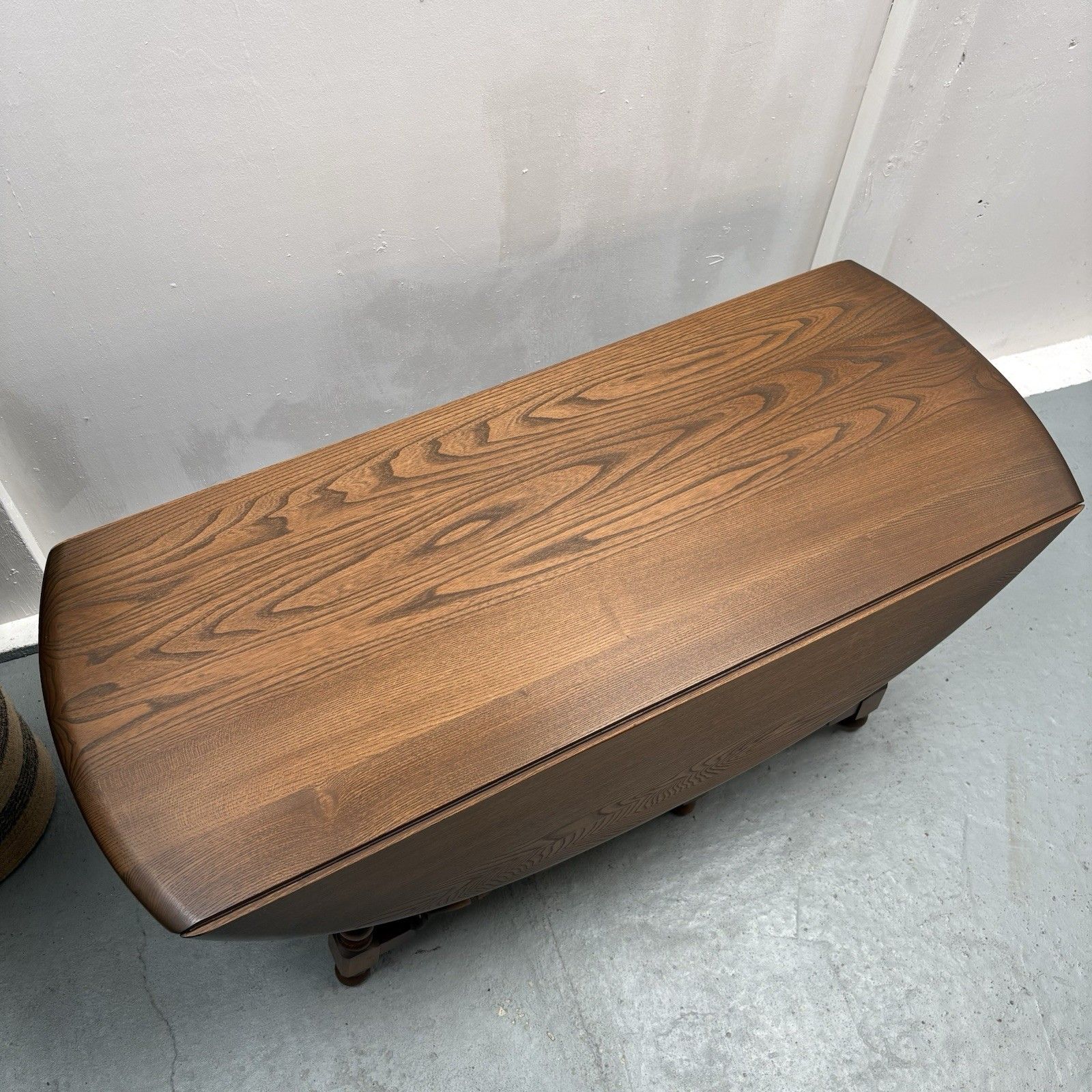 Ercol Trinity Solid Elm 2 Tier Drop Leaf Coffee Table In Golden Dawn photo 275.0