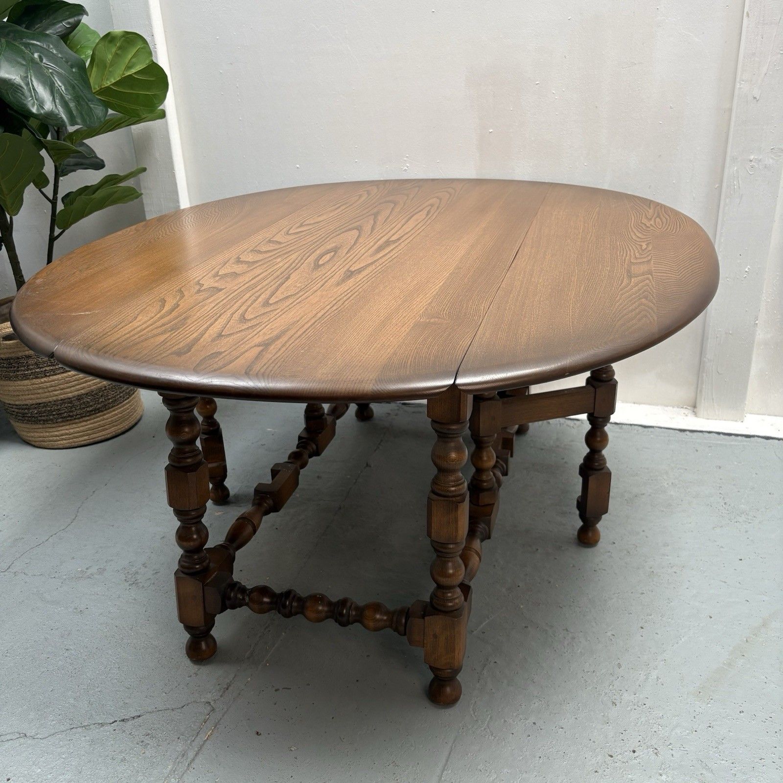 photo vinterior Ercol Trinity Solid Elm 2 Tier Drop Leaf Coffee Table In Golden Dawn
