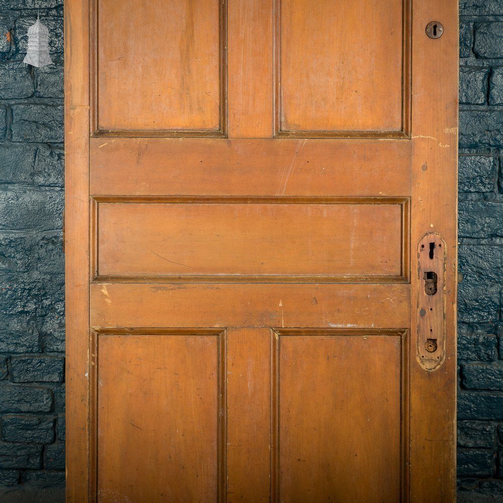 Home Fixtures Moulded 5 Panel Wooden Door With A Varnished Finish photo
