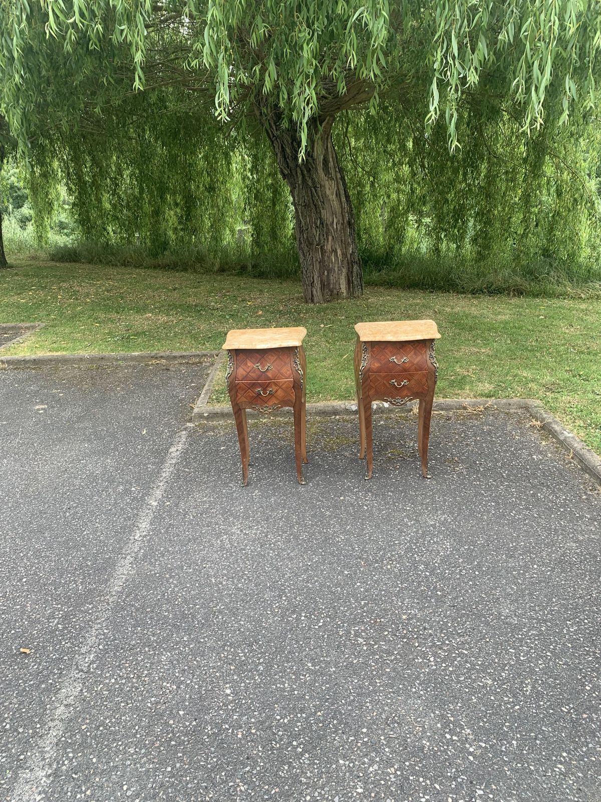 A Pair Of French Rosewood Bedside Tables