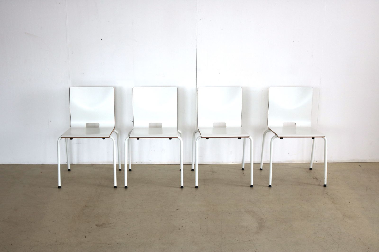 Set Van 4 Industriële Stapelstoelen photo for sale