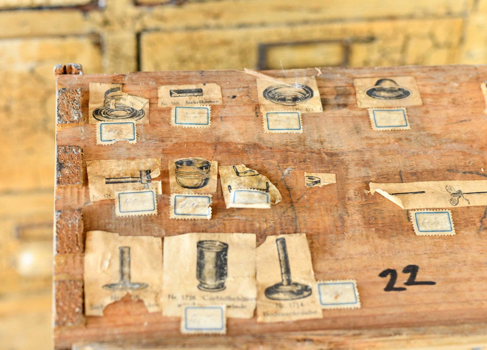 photo vintage Early 20th Century Bicycle Repair Shop Drawer Cabinet