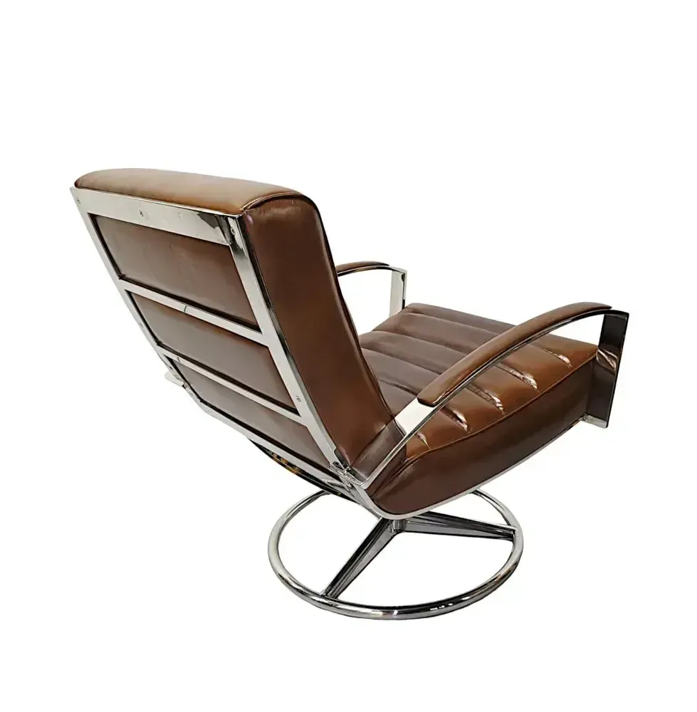 A Stunning Mid Century Style Leather And Chrome Revolving Armchair photo buy
