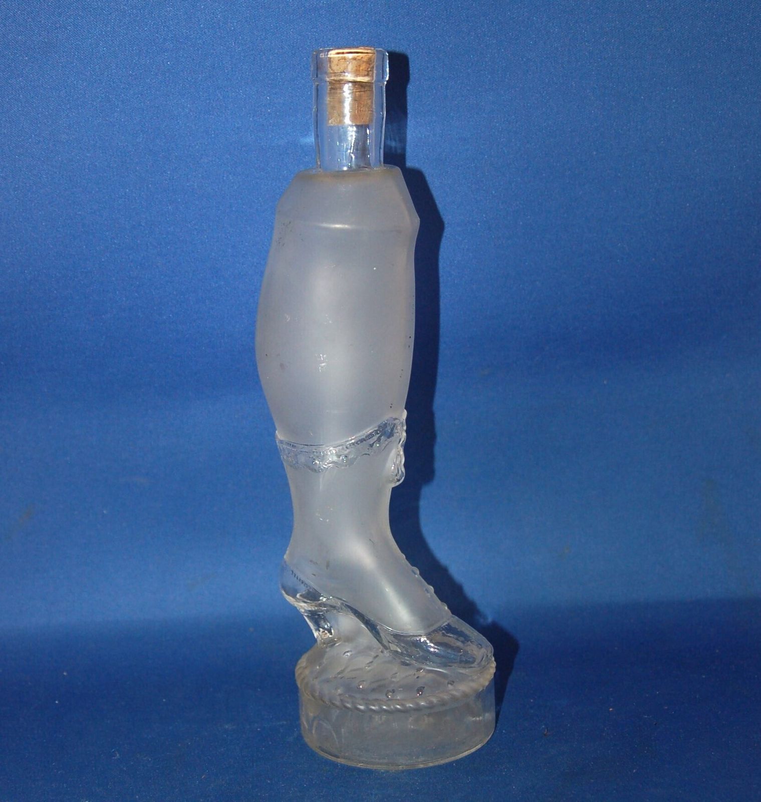 An Antique Lady’s Leg Scent Bottle, Opaque And Clear Glass