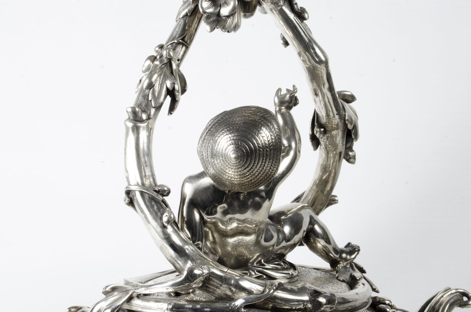 photo for sale Late 19th Century Christofle Rococo Revival Silvered Metal Decorative Centerpiece Of Reclining Child With Baccarat Cut Crystal Compote Bowls, France