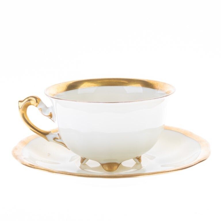 German Koenigszelt Gilt Porcelain Teacup With Saucer