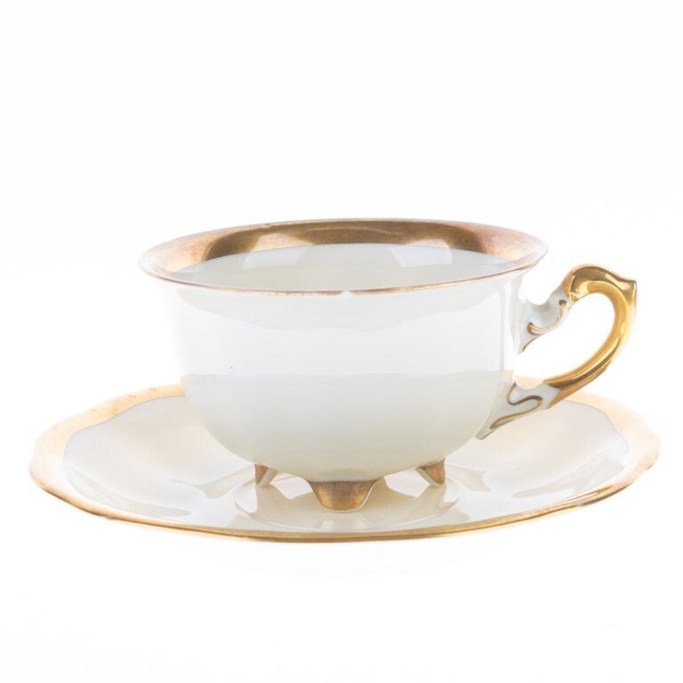 German Koenigszelt Gilt Porcelain Teacup With Saucer