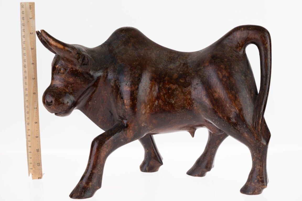 Wooden Sculpture Of A Bull photo Art