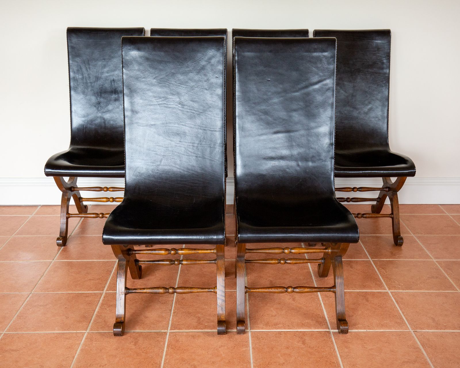10250.0 6 Spanish Oak Leather Dining Chairs By Pierre Lottier Valmazan Mid Century Neoclassical Colonial 1960s Black Leather Sling Seat Studded Leather photo